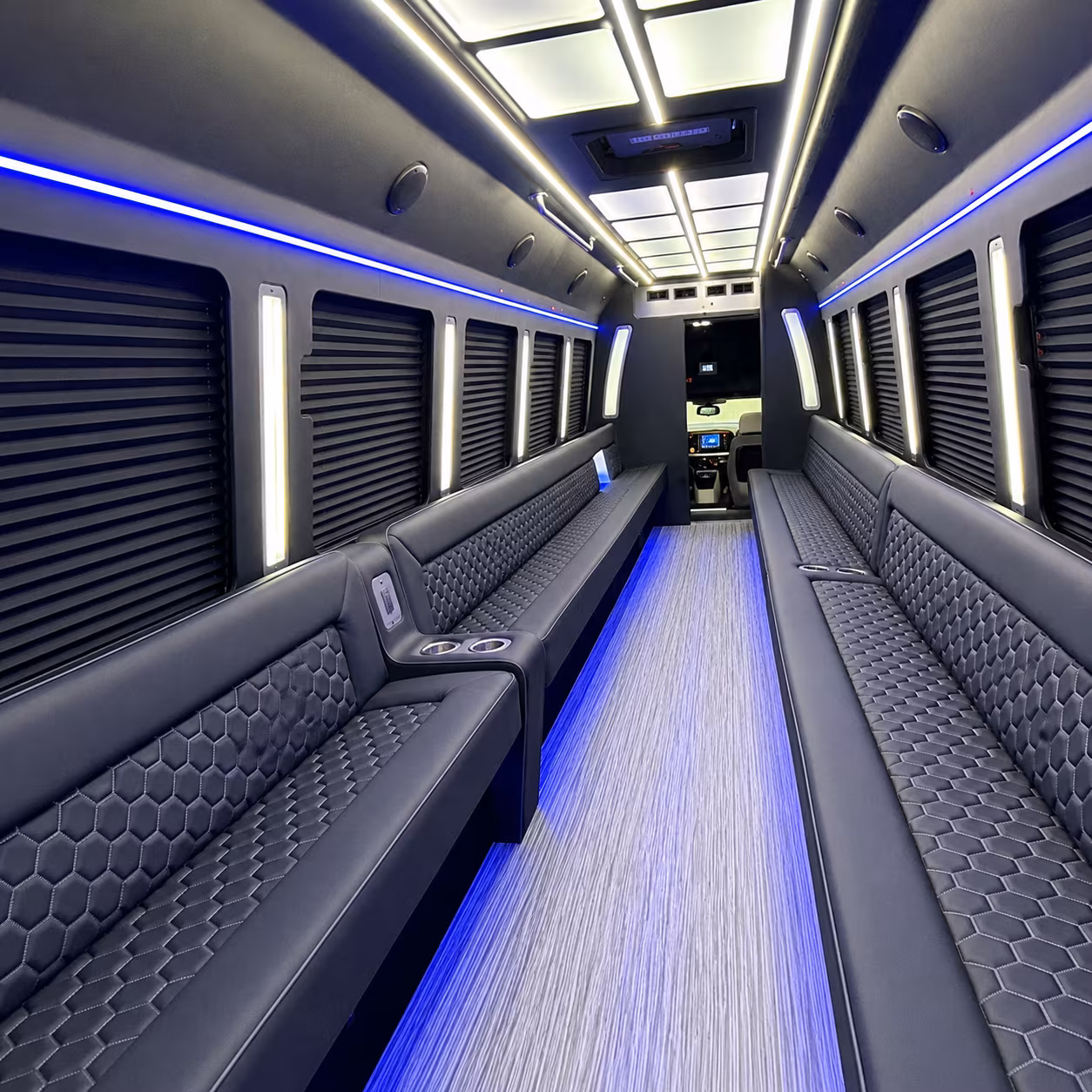 Friends laughing during a party bus celebration in Nashville