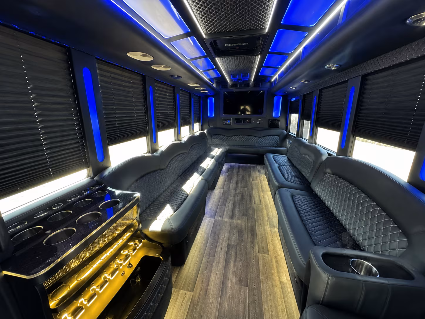 Group beside a Mercedes Sprinter limo in Nashville